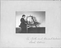 SA1428 - Sarah Collins at a tape loom. Photograph is inscribed to the Andrewses.